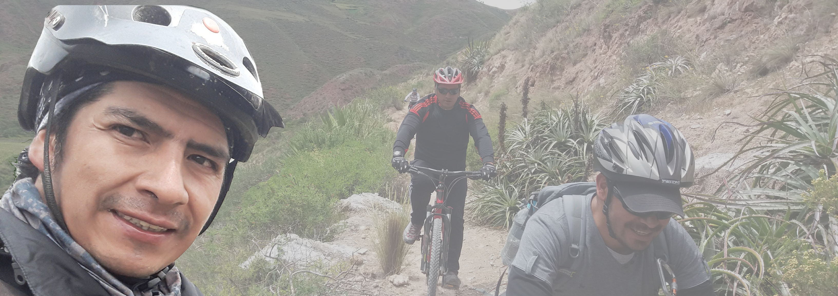 Guido riding with the group along a mountain trail in the Sacred Valley